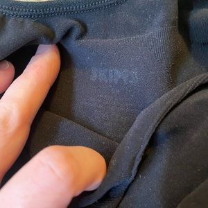 Skims sculpting bodysuit thong in black